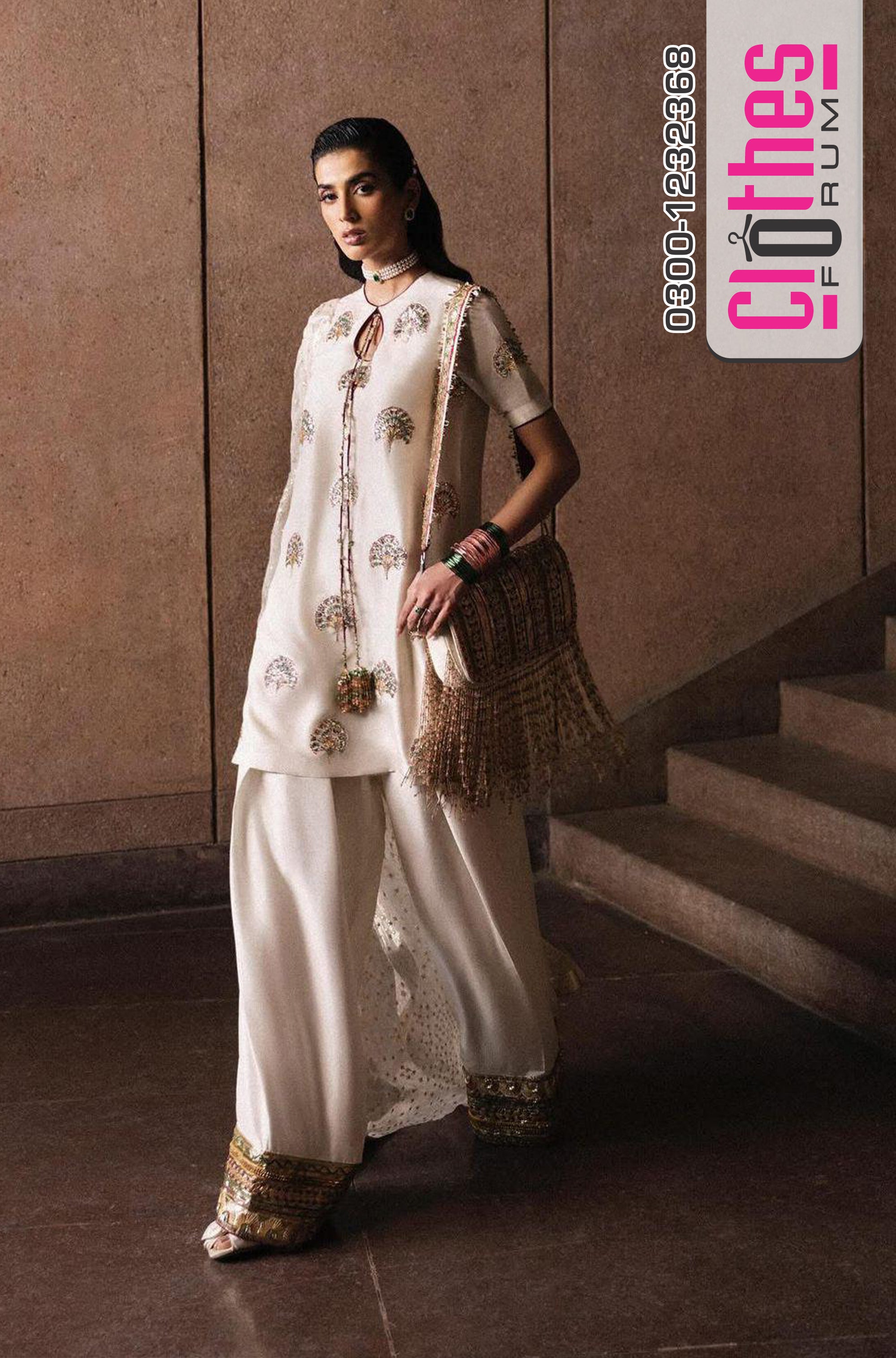 Elegant White Handmade Masterpiece by Hussain Rehar