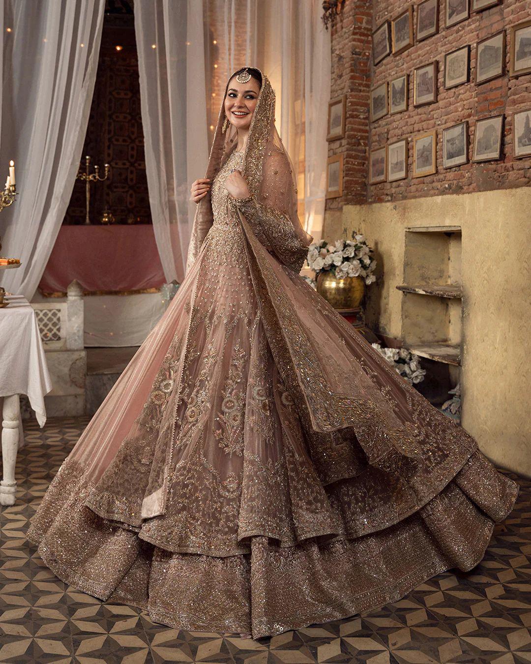 Faiza Saqlain Peach Pink Bridal Lehenga Maxi – A Timeless Wedding Elegance