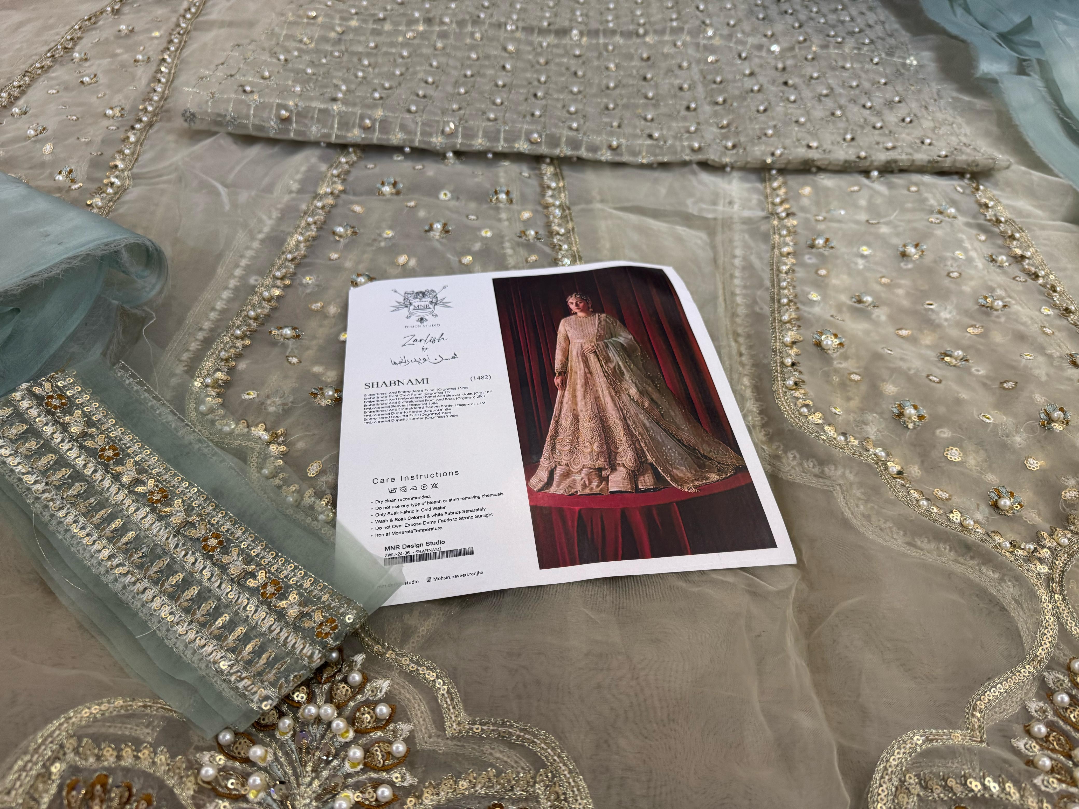 Mohsin Naveed Ranjha Luxe Bridal Collection – Majestic Ivory & Gold Handcrafted Masterpiece